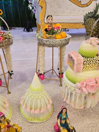 Our Thai-inspired floral and fruit arrangements are a unique addition to our baby shower setups, blending international artistry with local traditions.