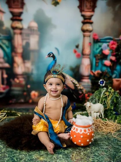 Another beautiful, smiling portrait from this divine Krishna-themed baby photoshoot.