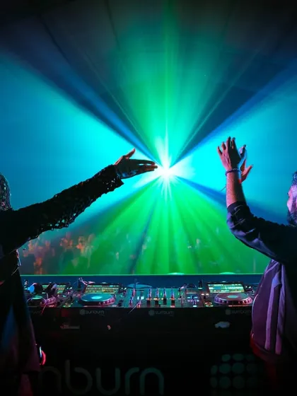 A stunning visual from a B2B set with Almost Human, with lasers creating a starburst effect. We always aim for a top-tier audio-visual experience.