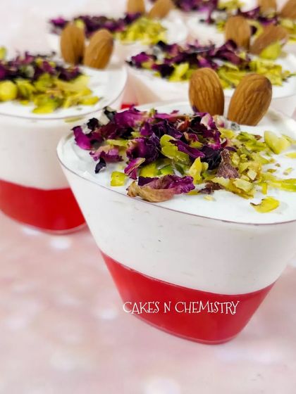 These Thandai berry dessert jars are a beautiful and convenient treat for Holi parties. They feature layers of cake, cream, and berries with the distinct flavor of Thandai, garnished with almonds and rose petals.
