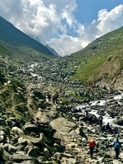Navigating a rocky path alongside a rushing stream. This trek is a full-body experience, engaging your senses and demanding your full presence.