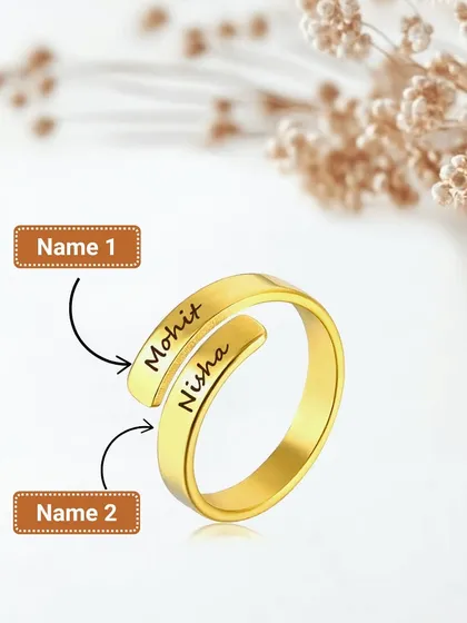 This graphic shows exactly where we engrave the two names on our custom couple ring, making it easy to visualize your own personalized piece.