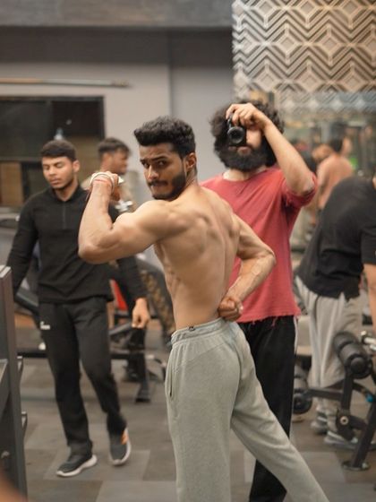 Don't underestimate natural bodybuilding. A shot of me posing with clients after a great workout session.