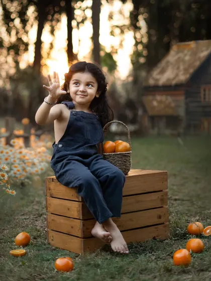 Waving hello from his orange grove! This outdoor themed shoot has a beautiful, rustic feel, perfect for capturing a child's adventurous side.