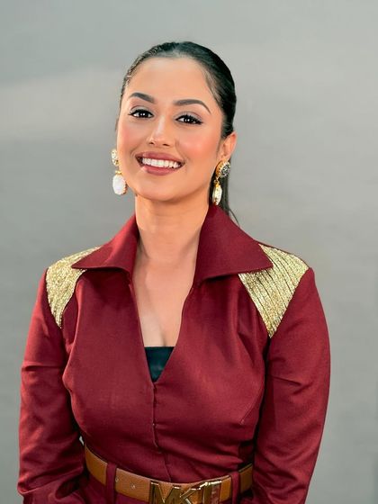 Another shot of Neetha's awards night look. The makeup is designed to look flawless on camera and under the bright lights.