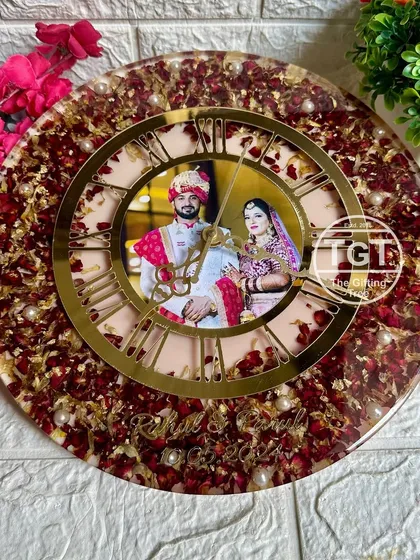 Another look at the photo-centric clock design, showing the rich color of the preserved rose petals mixed with gold flakes.