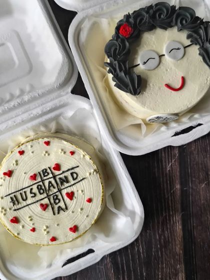 This set was for a joint birthday celebration for a dad and grandmother. It includes the "Husband Dad Baba" tic-tac-toe cake and the adorable grandmother portrait bento.