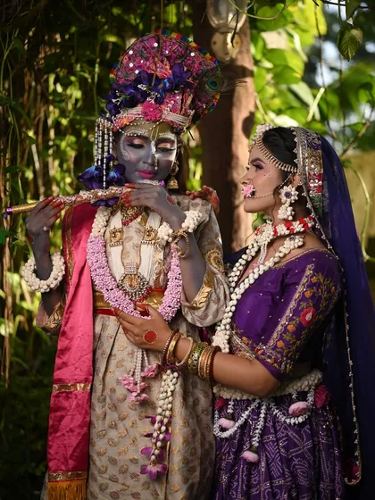 A tender moment between Radha and Krishna.