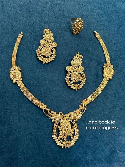 And back to more progress. An old necklace set is laid out, waiting for its turn to be reimagined. Every piece has potential, and we're excited to unlock it.