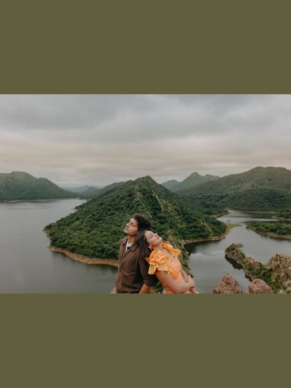 A quiet, intimate moment between Abhishek and Raashi during their pre-wedding shoot in Udaipur. Leaning on each other against the backdrop of the Aravalli hills and serene lakes, this shot is pure romance.