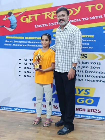 I had the honor of presenting an award to one of the young champions at the WCG Women's Special Badminton Tournament.