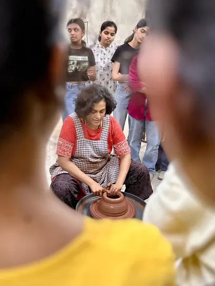 Teaching is a process of sharing and guiding. Here, I am demonstrating wheel throwing techniques to a group of architecture students. My greatest joy is seeing that moment of understanding and excitement as they begin to shape the clay themselves.