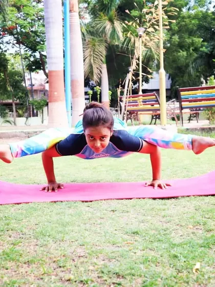 This is Kaundinyasana, an advanced arm balance that engages the entire core and improves spinal flexibility. I teach the component parts of poses like this, so you can build the strength and confidence to fly.