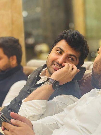 A candid moment during a conversation. Building rapport is key in my line of work.