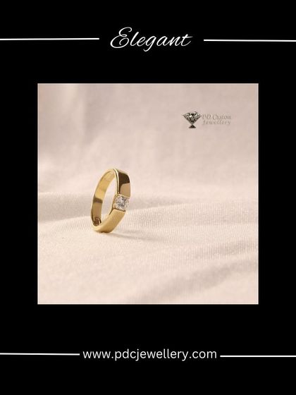 The solitaire ring is a timeless choice for men. This elegant design features a single, brilliant diamond set in a smooth 18kt hallmarked gold band, offering a look of understated confidence and class.