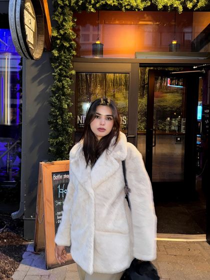 A night shot from my birthday trip to Blue Mountain, showing my cozy fur coat.