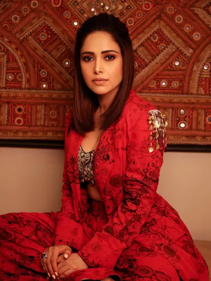 Here's a bold, printed red co-ord set I styled for Nushrratt Bharuccha. The embellished shoulder detail adds a touch of glam, making this a standout look for an evening event.