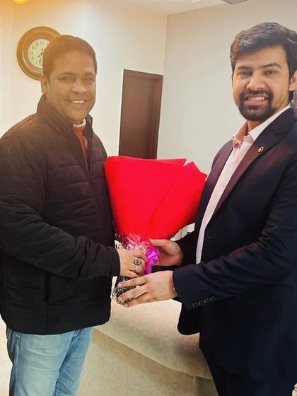 Presenting flowers to my senior, Mr. Ardhendumauli Kumar Singh, to congratulate him on his designation.