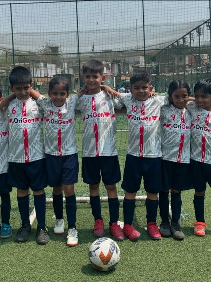 The U7 team huddled together, a perfect picture of unity and friendship at the very beginning of their football careers.