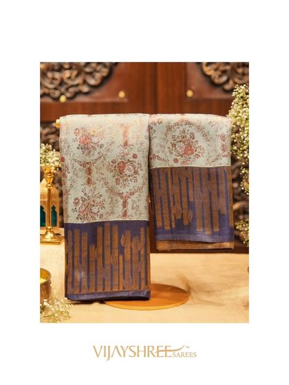 A beautiful Kanjivaram with delicate floral motifs and a stunning brass zari border.