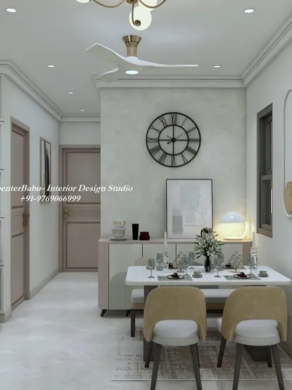 The dining area in this 2BHK features a bench on one side to save space and create a more casual feel. The wall decor and lighting are kept minimal to maintain a serene vibe.