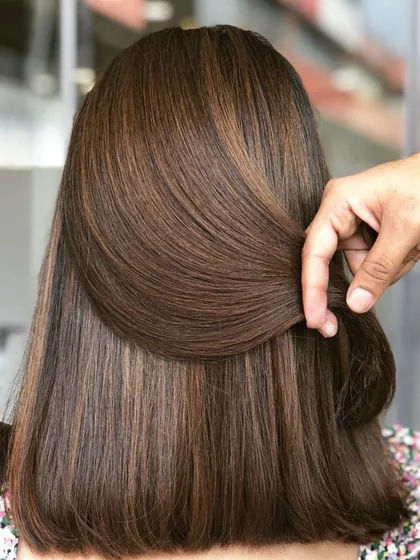 A beautiful balayage and bob haircut combination. The no-bleach color adds natural-looking dimension that perfectly complements the sharp lines of the cut.