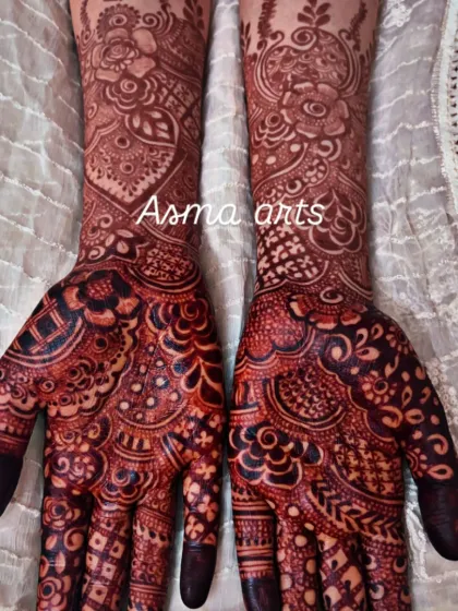 The final stain is everything. Here you can see the deep, intense color achieved on a dense floral design, proving the quality of my 100% organic henna paste.