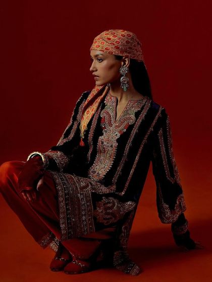 A powerful pose from the Debyani & Co "Memsahib" campaign. The rich red, paintable set was chosen to complement the luxurious velvet and intricate embroidery of the ethnic wear.
