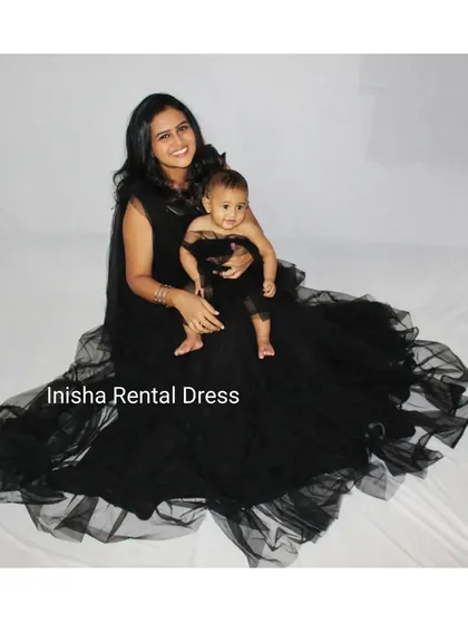 Capturing these precious moments is everything. My mom and daughter matching dress sets, like this black gown and baby tutu, are a wonderful way to celebrate your bond. I have different styles available for rent.