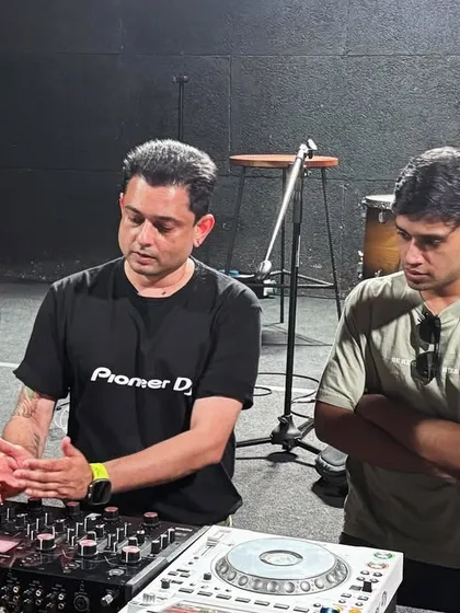 Explaining the signal flow and creative possibilities of the AlphaTheta Euphonia mixer to an engaged group. These small-group settings ensure everyone gets a chance to interact with the gear.