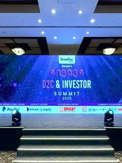 For the Engage D2C & Investor Summit, I designed a stage that was clean, professional, and tech-forward. The setup included a wide central LED wall for main presentations, flanked by branded screens and professional stage lighting to keep the focus on the speakers.