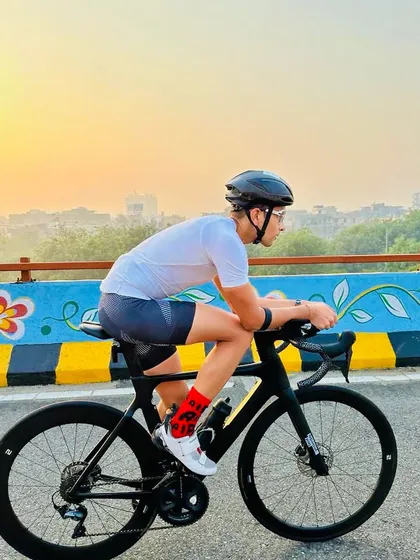 The birthday boy in a focused, aerodynamic position on his bike.