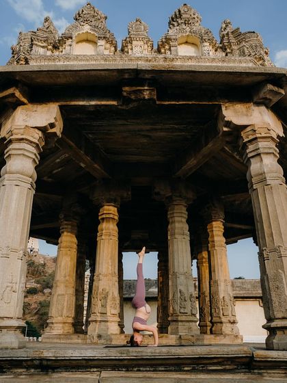 A demonstration of Sirsasana (Headstand) in a beautiful temple setting in Hampi. Inversions are a key part of the Ashtanga practice, building upper body strength and offering a new perspective.