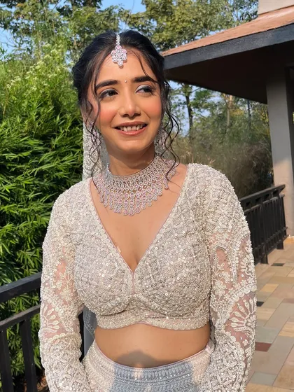 A candid smile from my happy bride. Her makeup is subtle yet impactful, creating a timeless look that she will cherish in her wedding photos for years to come.