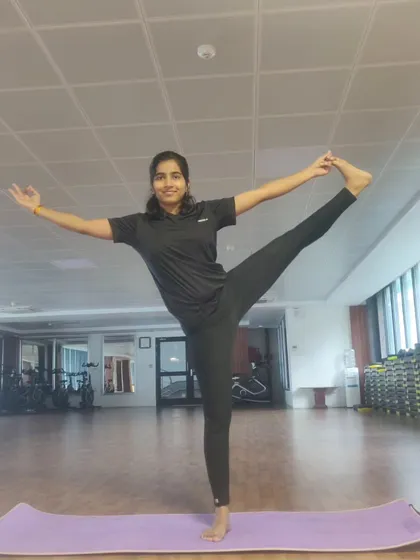 This is the Utthita Hasta Padangusthasana, or Extended Hand-to-Big-Toe Pose. It's a challenging posture that deeply tests your balance and flexibility.