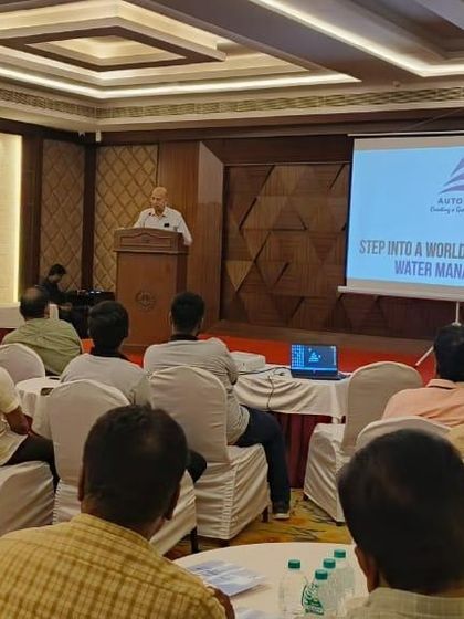 A speaker at our technical seminar presents on "A World of Intelligent Water Management," sharing our vision for a smarter agricultural future.
