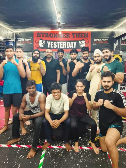 My team is my strength. A group photo that captures the spirit of our gym.