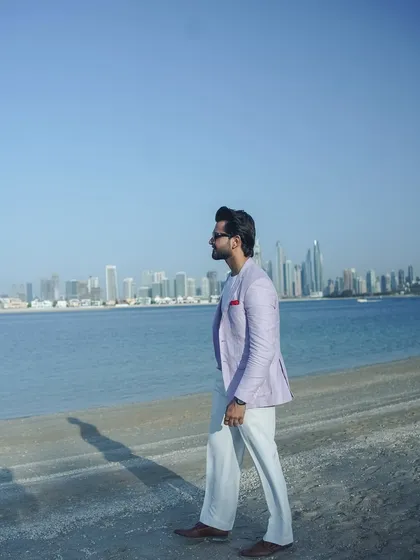 Serving skyline, sass, and sand in Dubai. My persona is a blend of confidence and style, perfect for a glamorous beachside event.