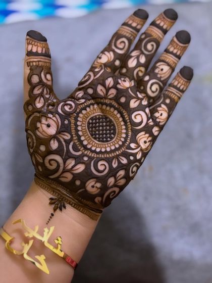 Another angle of the cutwork design, highlighting the delicate details.