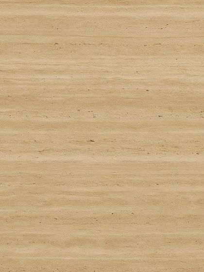 The soft, linear veins of Travertine marble. This particular stone is excellent for creating a sense of calm and openness in larger spaces, lending a quiet sense of luxury.