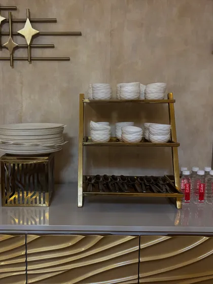 Another angle of the crockery and cutlery setup, showing our attention to organized and clean presentation.