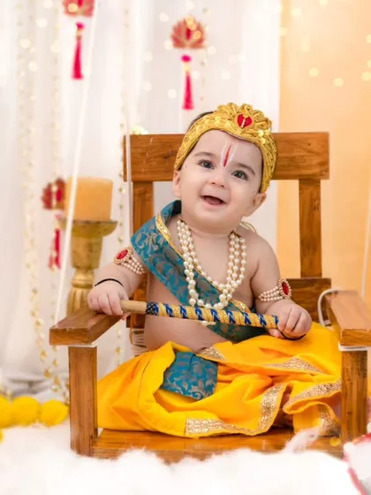 Celebrating tradition with a touch of innocence. This 'Little Kanha' themed shoot is one of my favorites, using rich colors and authentic props to create a divine and adorable portrait for your little one.