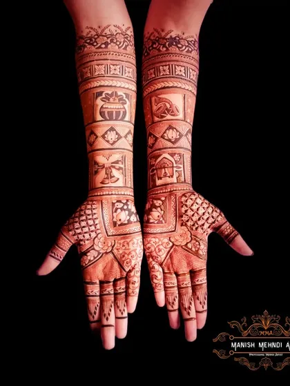 This unique bridal design tells a story through different panels on the arms. Each block contains a different traditional wedding symbol, like a doli or kalash, making the mehndi very personal.