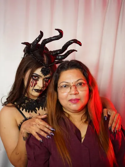 A chillingly beautiful dark fantasy look, created with my student. This photo showcases the SFX makeup, including the bloody tears and dark veins, and the custom headpiece that completes the character.