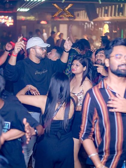 The diverse crowd at XS Superclub in Bhubaneswar, all united by the music.