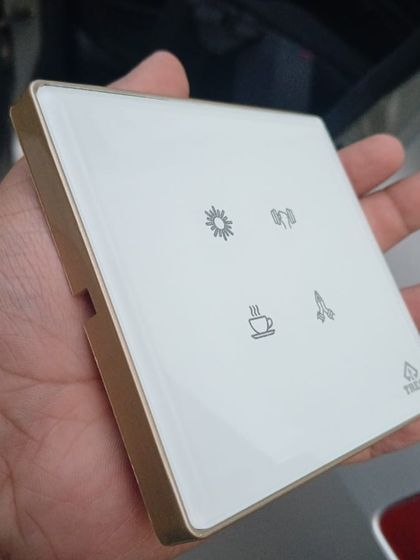 This glass touch keypad is a beautiful example of modern home control. The minimalist icons for different scenes like "Morning" or "Relax" provide an intuitive and stylish way to manage your home's automation.