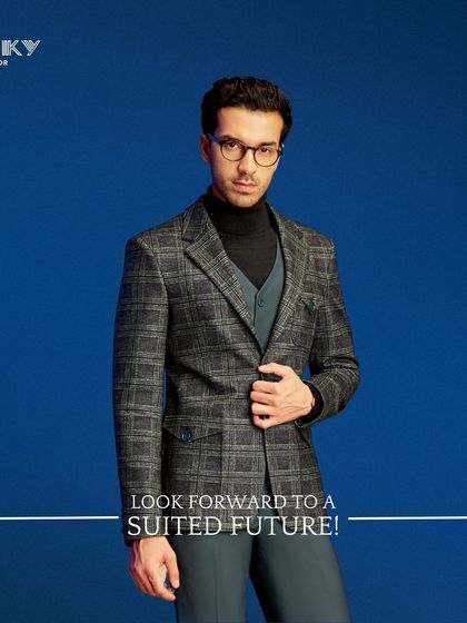 Look forward to a suited future. This grey plaid blazer, layered over a turtleneck and waistcoat, is designed to radiate sophistication and modern elegance.
