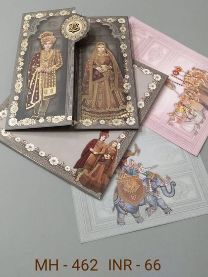 A unique invitation set designed like a storybook, with illustrations of the bride, groom, and wedding procession. The multiple inserts continue the narrative of your celebration.
