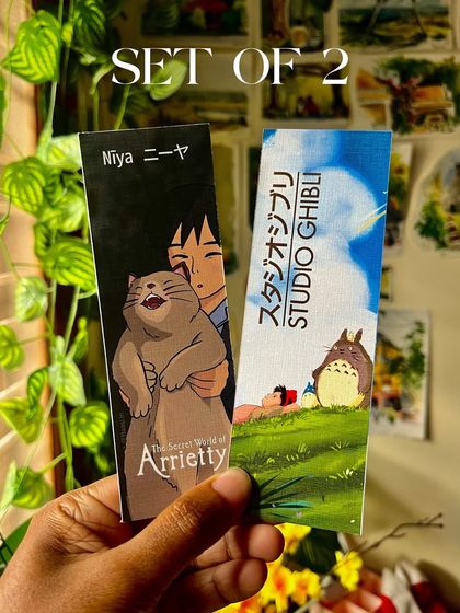 This set of two bookmarks features Niya from 'The Secret World of Arrietty' and a peaceful Totoro scene.