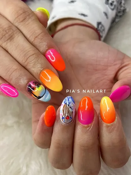 When the feed is calling for colorful nails. A bright and fun set with neon ombre and abstract art.